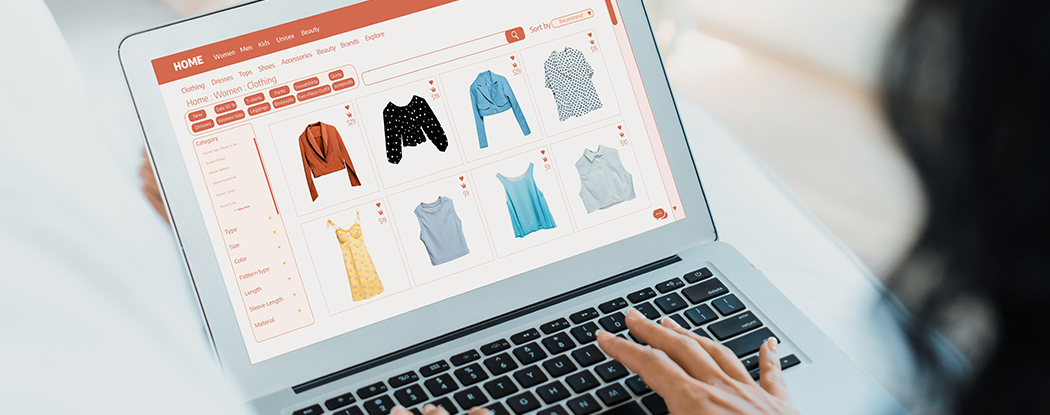 Person browsing ecommerce website on laptop displaying online store products, representing accessible ecommerce shopping experience