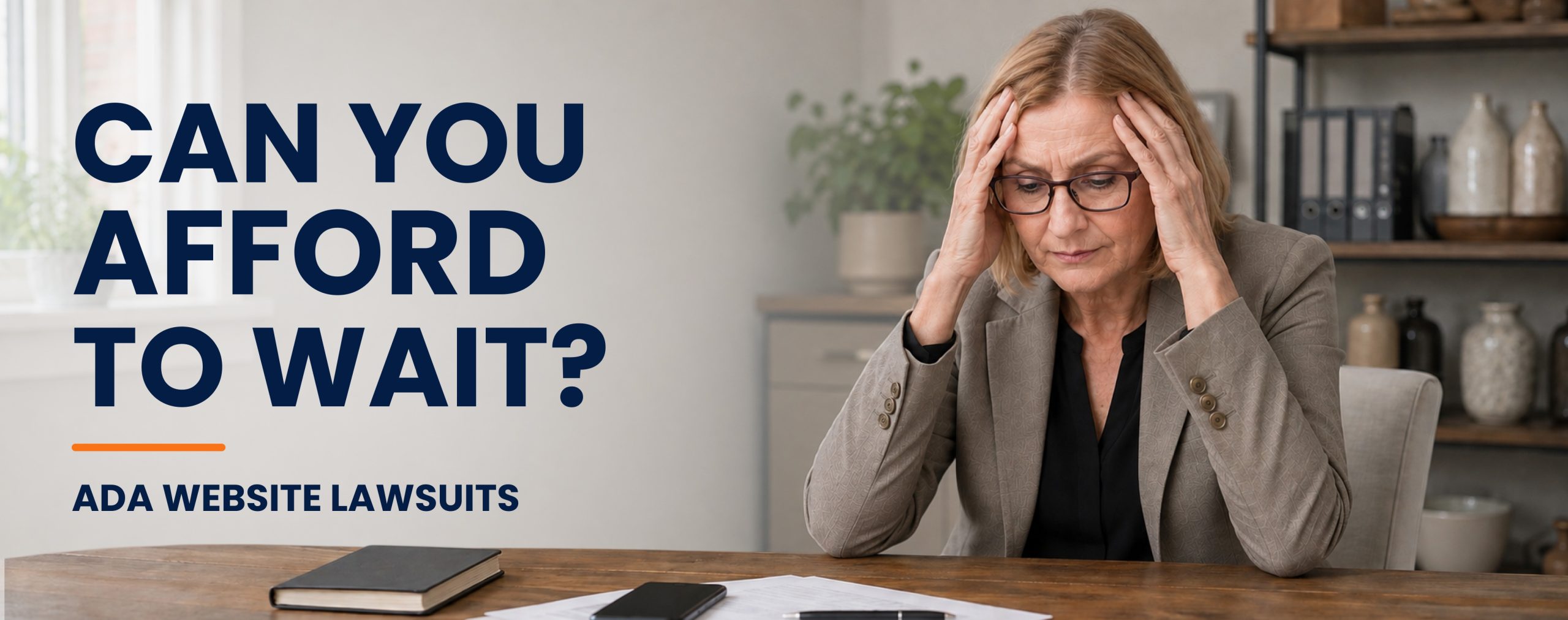Person worried about ADA website lawsuits and compliance risks at desk